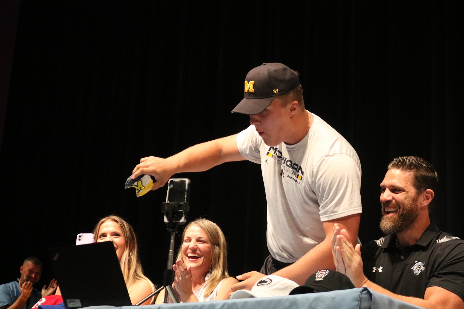 Jake Guarnera took a bite out of a Michigan frosted donut to celebrate his decision.